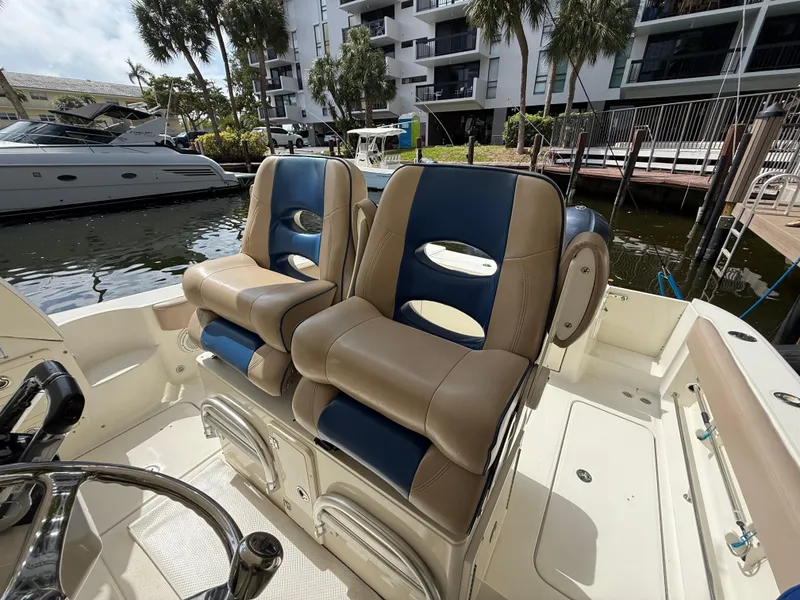 Slide: The Image of 2008 Hydra-Sports Vector 3500 VX boat seats, docked near waterfront buildings. - 38