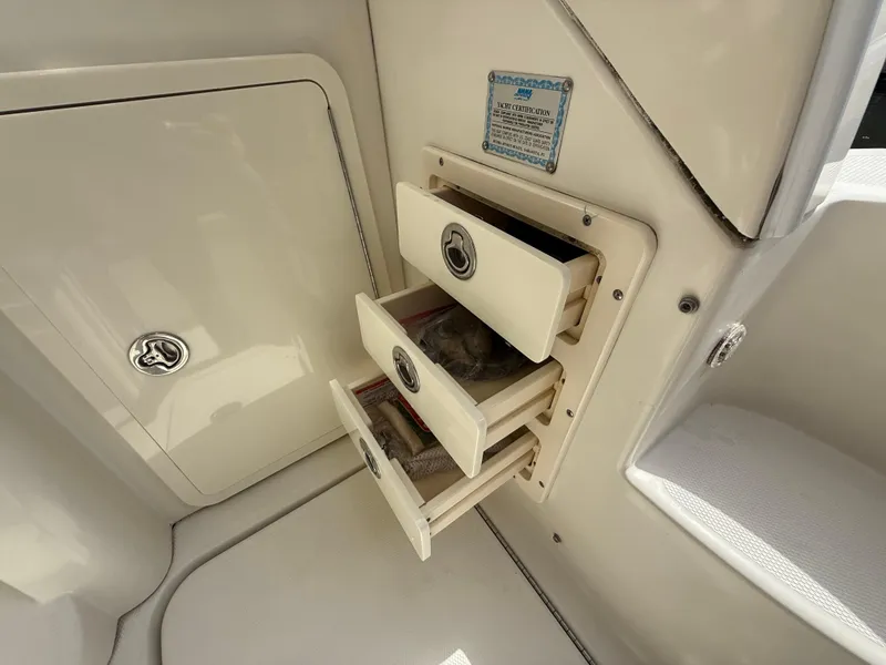 Slide: The Image of 2008 Hydra-Sports Vector 3500 VX boat storage drawers and compartment. - 42