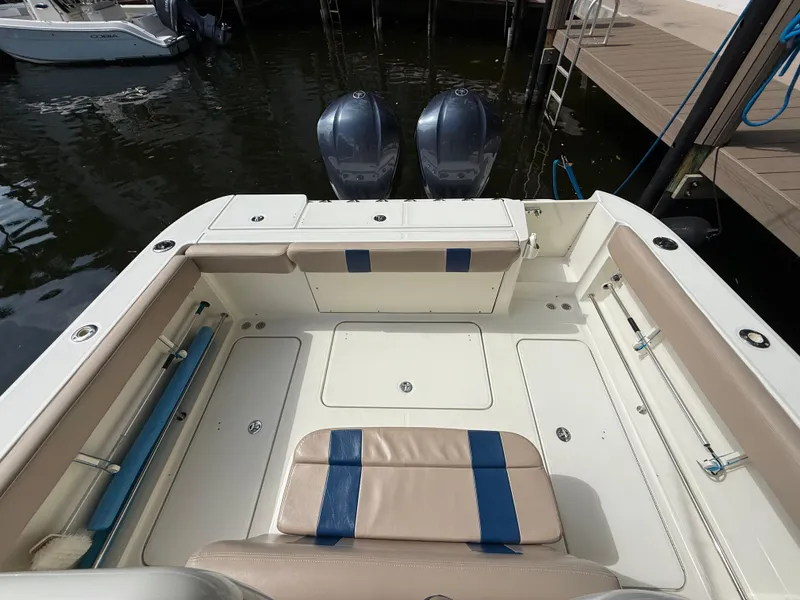 Slide: The Image of 2008 Hydra-Sports Vector 3500 VX boat interior with dual engines at dock. - 47