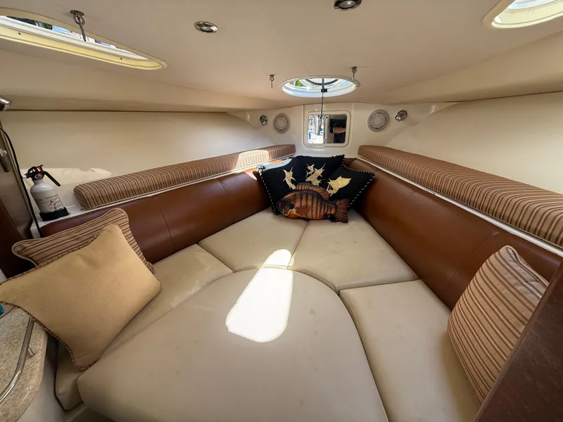 Slide: The Image of 2008 Hydra-Sports Vector 3500 VX cabin interior with cozy seating and decorative pillows. - 7