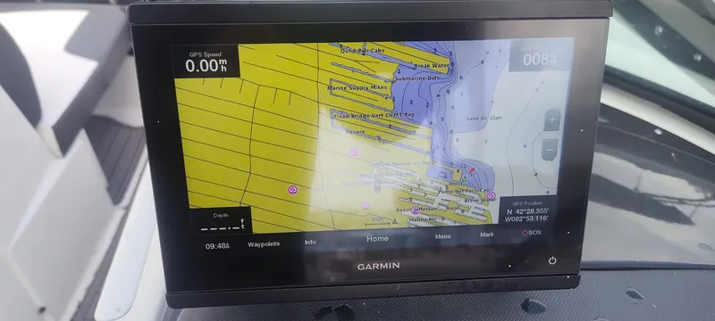 Slide: The Image of Garmin navigation display on a 2021 Monterey M4 boat, showing nautical map details. - 14