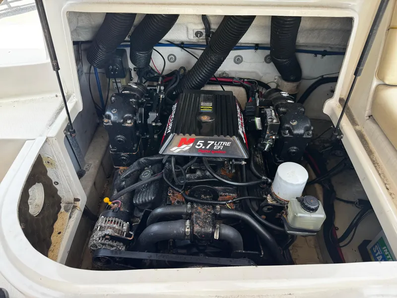 Slide: The Image of Engine compartment of a 2001 Sea Ray 240 Sundeck with 5.7L EFI engine. - 12