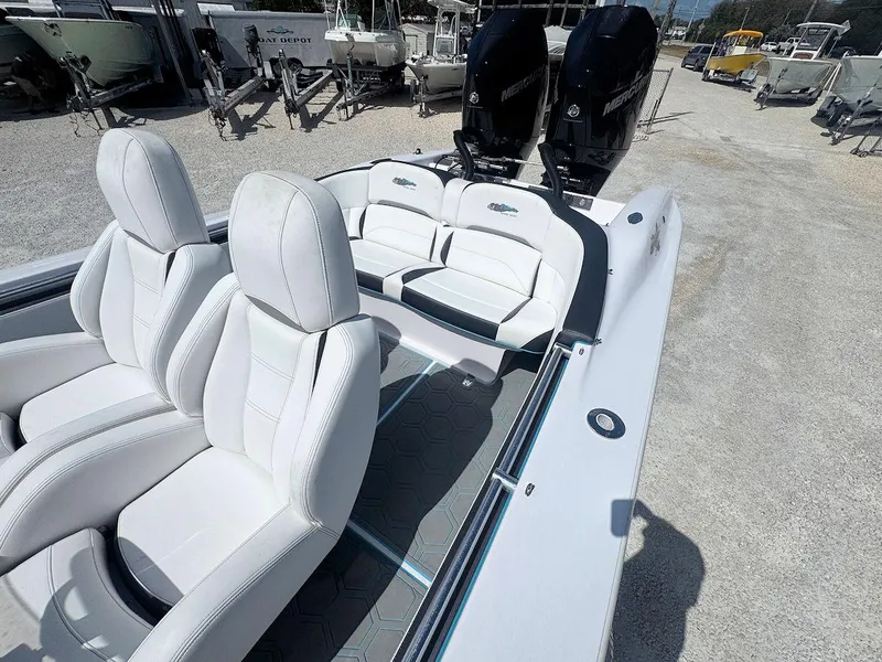 Slide: The Image of 2022 Phantom 32 CC boat with white seating and dual outboard engines. - 9