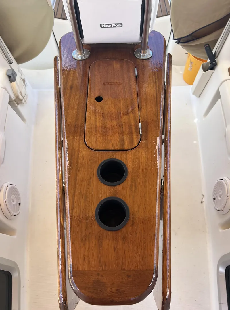 Slide: The Image of Cockpit of 2010 Jeanneau Sun Odyssey 39i Performance sailboat with wooden console. - 11