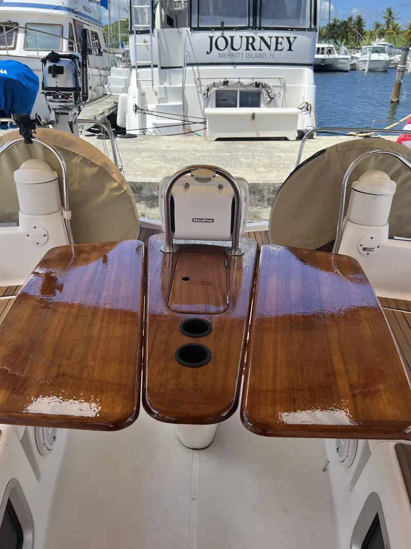 Slide: The Image of 2010 Jeanneau Sun Odyssey 39i Performance yacht with polished wooden cockpit table. - 12