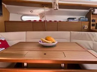 Slide: The Image of Interior of 2010 Jeanneau Sun Odyssey 39i Performance yacht with dining table and fruit bowl. - 20