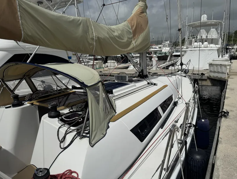 Slide: The Image of Jeanneau Sun Odyssey 39i Performance 2010 sailboat docked at marina, side view. - 3