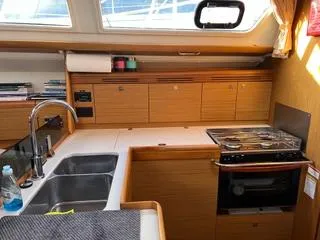 Slide: The Image of Interior of 2010 Jeanneau Sun Odyssey 39i Performance yacht kitchen with sink and stove. - 29