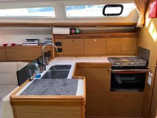 Slide: The Image of Interior of 2010 Jeanneau Sun Odyssey 39i Performance yacht kitchen area. - 32