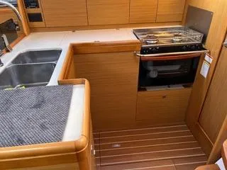 Slide: The Image of Interior of 2010 Jeanneau Sun Odyssey 39i Performance yacht kitchen with stove and sink. - 33