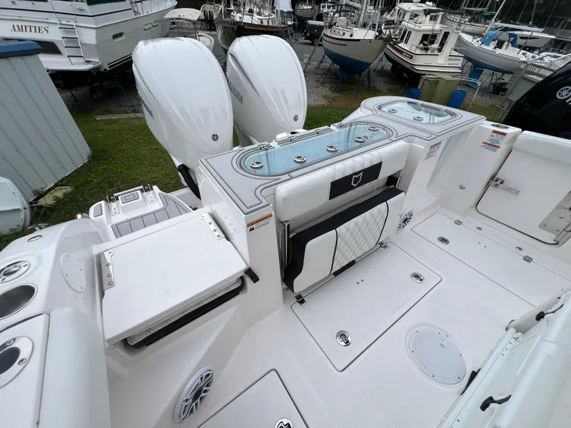 Slide: The Image of 2025 Sea Fox 288 Commander boat with dual engines and spacious deck layout. - 18
