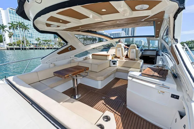 Slide: The Image of Luxurious 2014 Cranchi 56 HT yacht interior with elegant seating and modern design. - 21