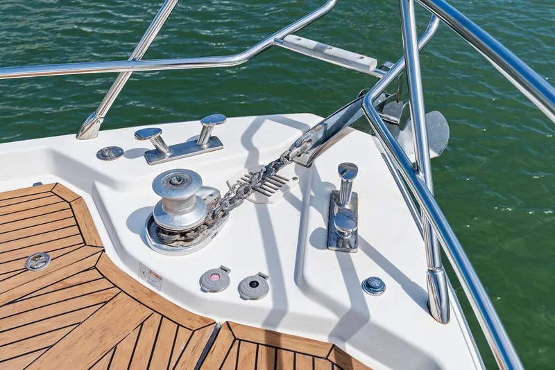 Slide: The Image of Bow of 2014 Cranchi 56 HT yacht with anchor system and teak decking. - 32