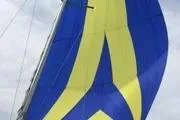 Slide: The Image of Sailboat with blue and yellow sail, Beneteau FIRST 25 S, 2014 model. - 11