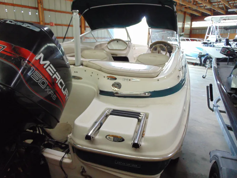 Slide: The Image of 1999 Maxum 1800 XR boat with Mercury engine in storage. - 10