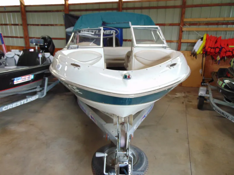 Slide: The Image of 1999 Maxum 1800 XR boat in storage facility. - 3