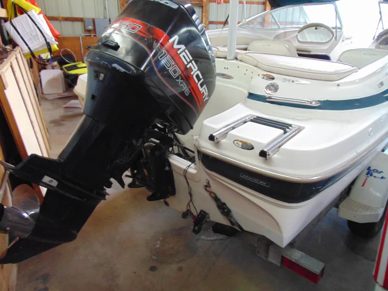 Slide: The Image of 1999 Maxum 1800 XR boat with Mercury outboard motor. - 7