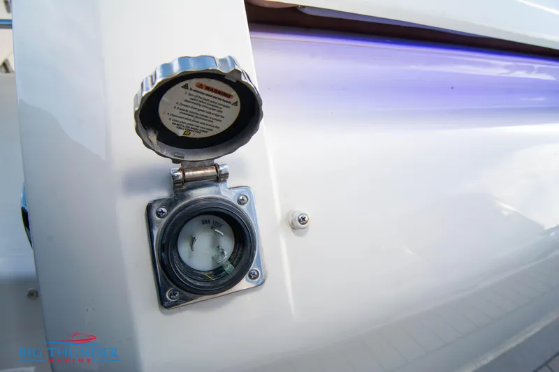 Slide: The Image of 2022 Scout 350 LXZ boat fuel gauge and cap detail. - 11