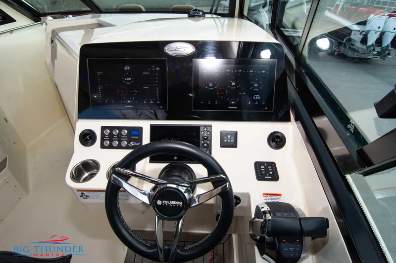 Slide: The Image of 2022 Scout 350 LXZ helm with dual displays and modern controls. - 45