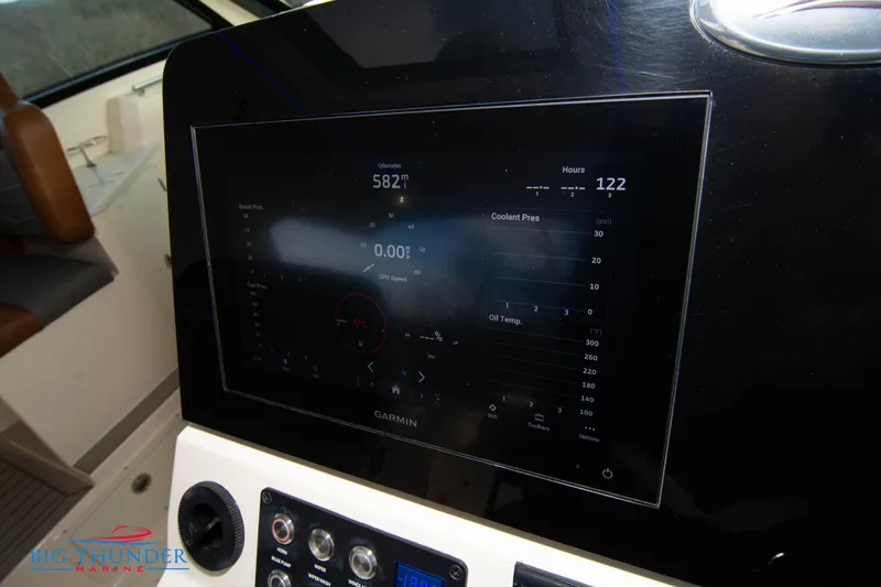 Slide: The Image of 2022 Scout 350 LXZ dashboard with digital display and controls. - 46