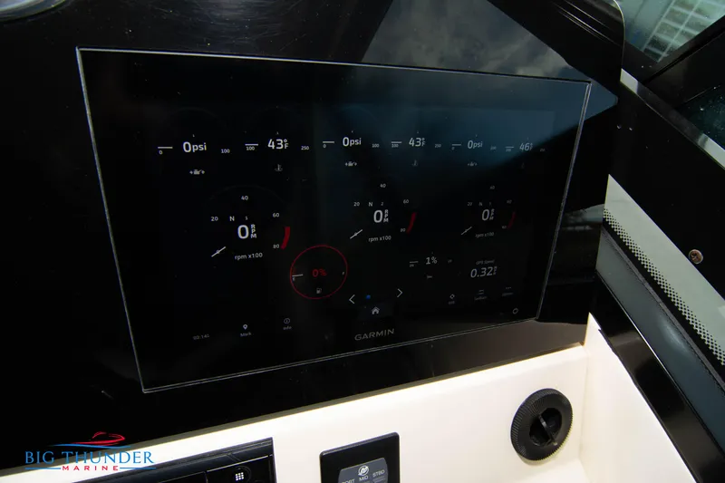 Slide: The Image of Dashboard display of 2022 Scout 350 LXZ boat with Garmin interface. - 47