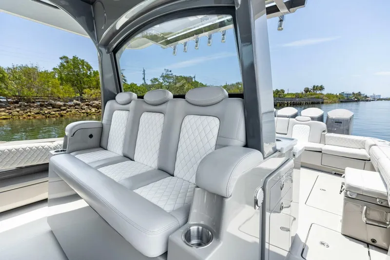 Slide: The Image of Luxurious seating on 2023 HCB 53 Sueños boat, featuring elegant white upholstery. - 17