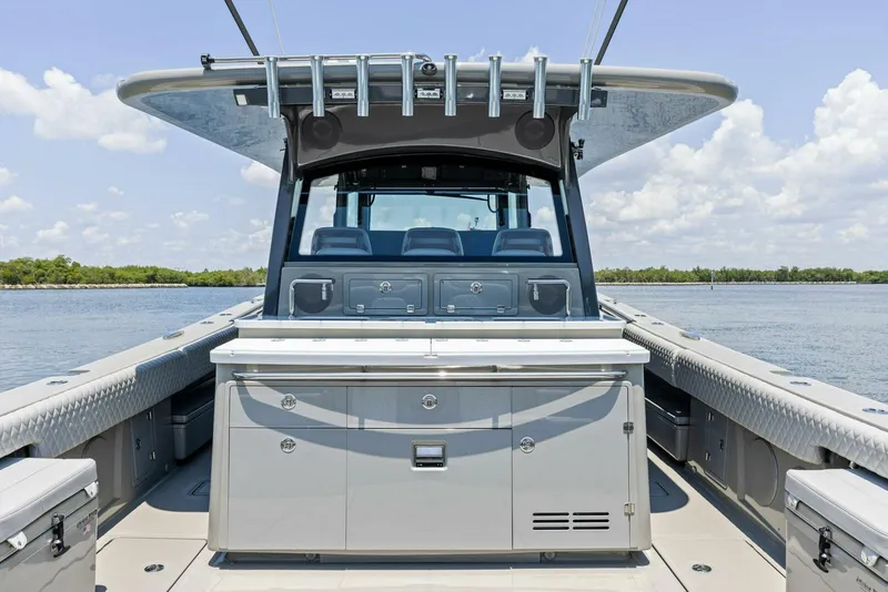 Slide: The Image of 2023 HCB 53 Sueños boat interior with sleek design and modern amenities on open water. - 6