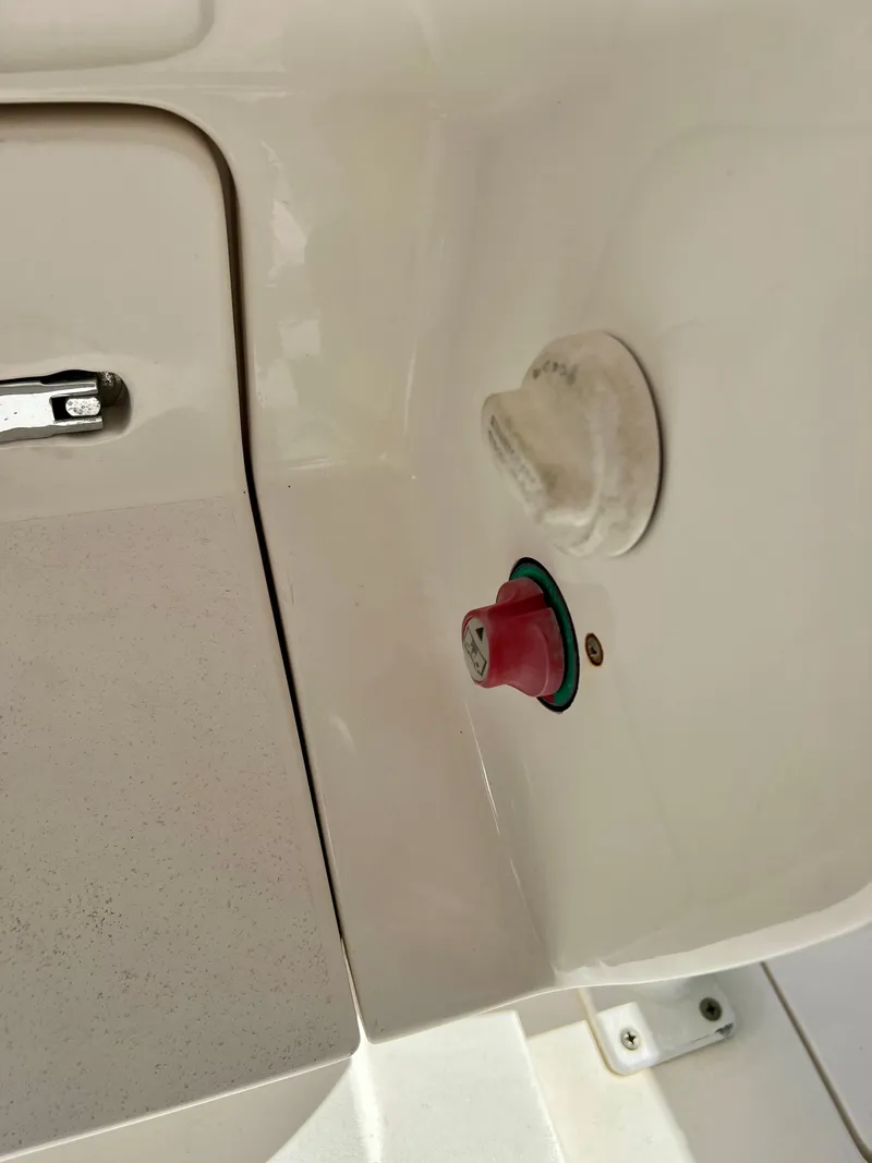 Slide: The Image of 2015 Intrepid 375 Center Console boat detail with red and white switches. - 14