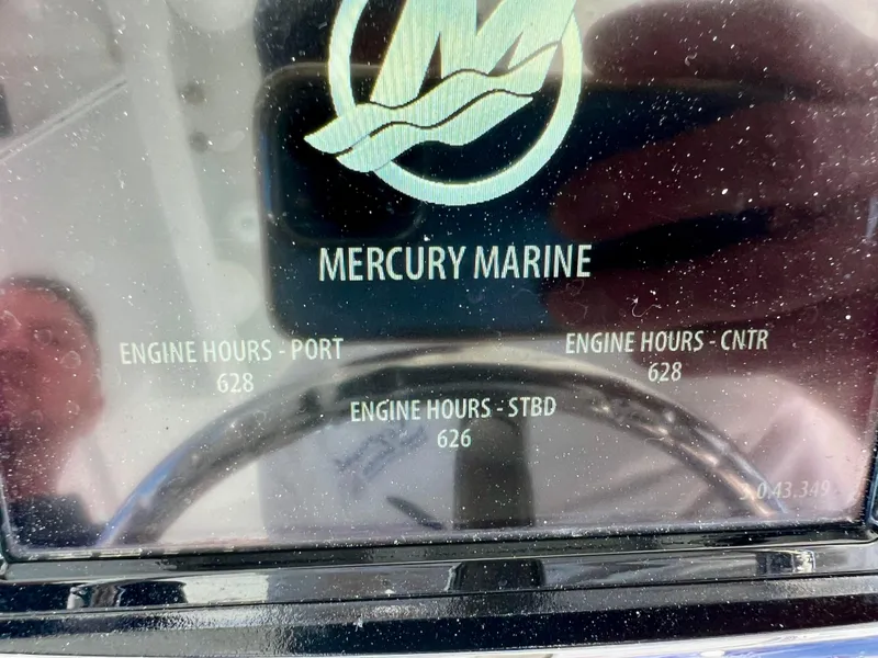 Slide: The Image of Mercury Marine engine hours display on 2015 Intrepid 375 Center Console boat. - 15