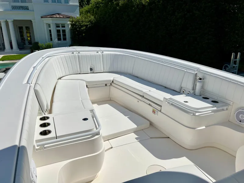 Slide: The Image of 2015 Intrepid 375 Center Console boat docked on a sunny day. - 6