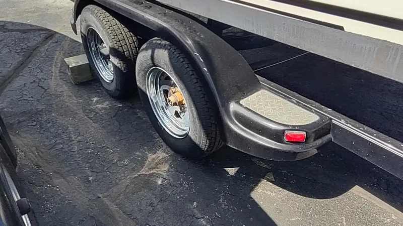 Slide: The Image of Trailer with dual wheels for 2001 Robalo 2020 Center Console boat. - 13