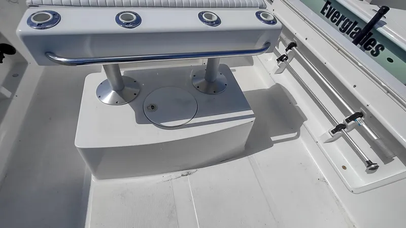 Slide: The Image of Robalo 2020 Center Console boat interior, featuring rod holders and seating, 2001 model. - 3