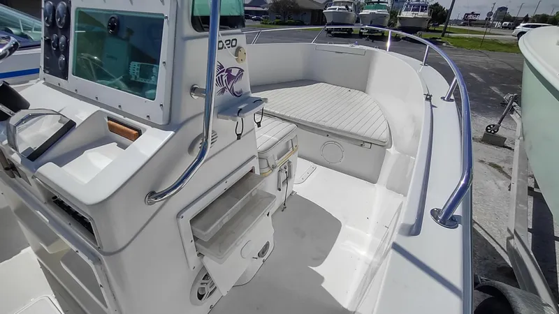 Slide: The Image of Robalo 2020 Center Console boat interior, featuring helm and seating area, 2001 model. - 6