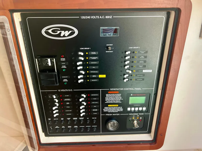 Slide: The Image of Electrical control panel on a 2021 Grady-White Freedom 375 boat. - 36