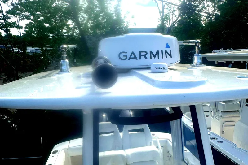 Slide: The Image of 2021 Regulator 25 boat with Garmin radar system on the roof. - 6