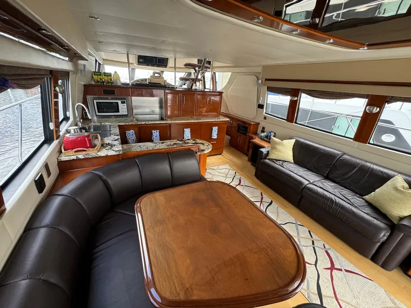 Slide: The Image of Luxurious interior of a 2006 Carver 56 Voyager yacht with modern amenities. - 25