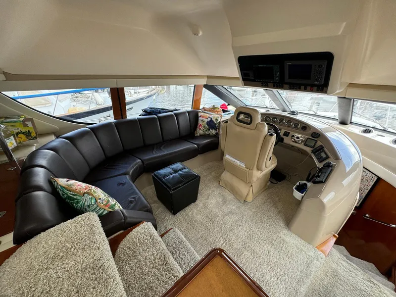 Slide: The Image of Luxurious interior of 2006 Carver 56 Voyager yacht with leather seating and modern helm. - 35