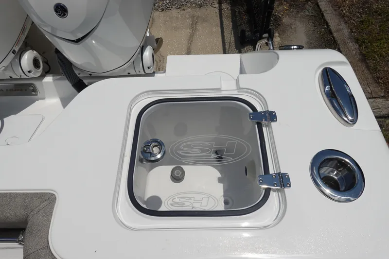 Slide: The Image of 2026 Sea Hunt Gamefish 30 Forward Seating boat with livewell and rod holders. - 13