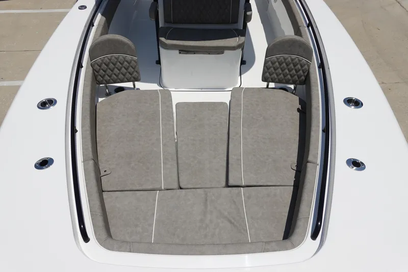 Slide: The Image of 2026 Sea Hunt Gamefish 30 Forward Seating with gray cushioned seats. - 32