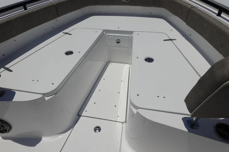 Slide: The Image of 2026 Sea Hunt Gamefish 30 Forward Seating, spacious deck with storage compartments. - 35