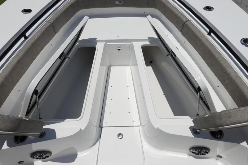 Slide: The Image of 2026 Sea Hunt Gamefish 30 Forward Seating with open storage compartments and cushioned seating. - 36