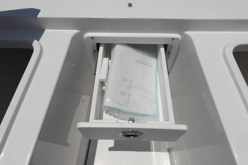 Slide: The Image of Storage compartment on 2026 Sea Hunt Gamefish 30 Forward Seating boat. - 38