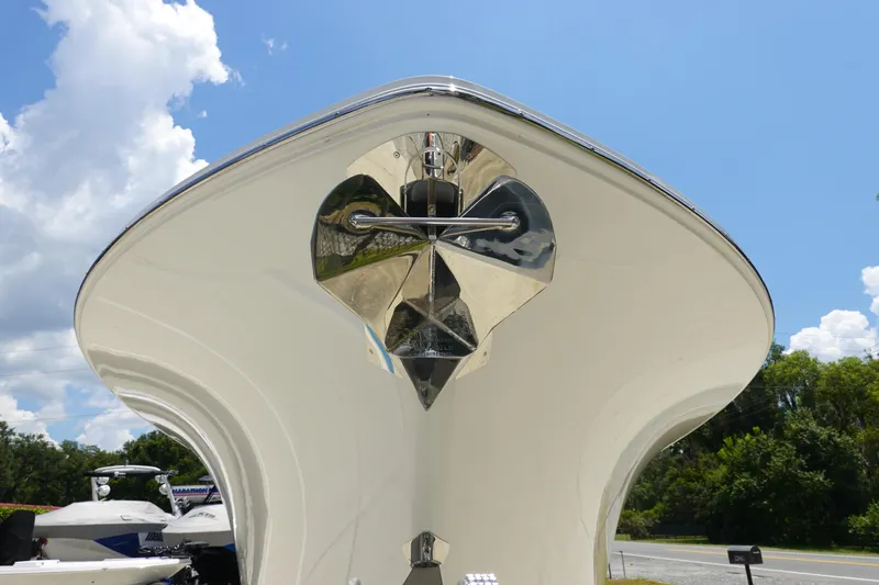 Slide: The Image of 2026 Sea Hunt Gamefish 30 Forward Seating boat, viewed from the bow under a clear sky. - 4