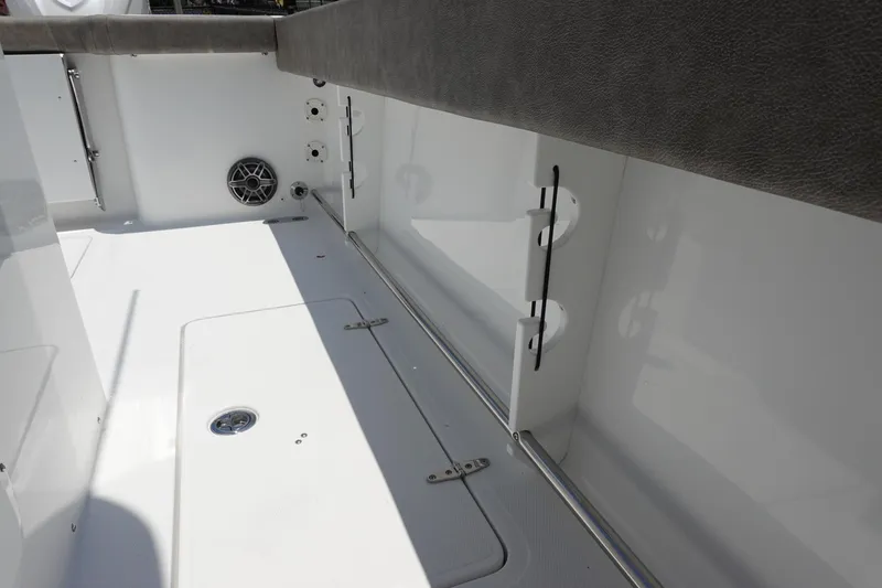 Slide: The Image of 2026 Sea Hunt Gamefish 30 Forward Seating interior with storage and speaker. - 46