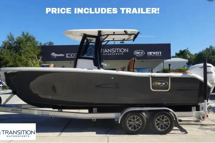 The Image of 2026 Sea Hunt Ultra 255 SE boat on trailer at Transition Watersports dealership. - 0