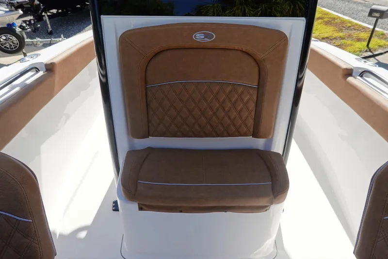 Slide: The Image of 2026 Sea Hunt Ultra 255 SE boat seat with brown diamond-stitched upholstery. - 26