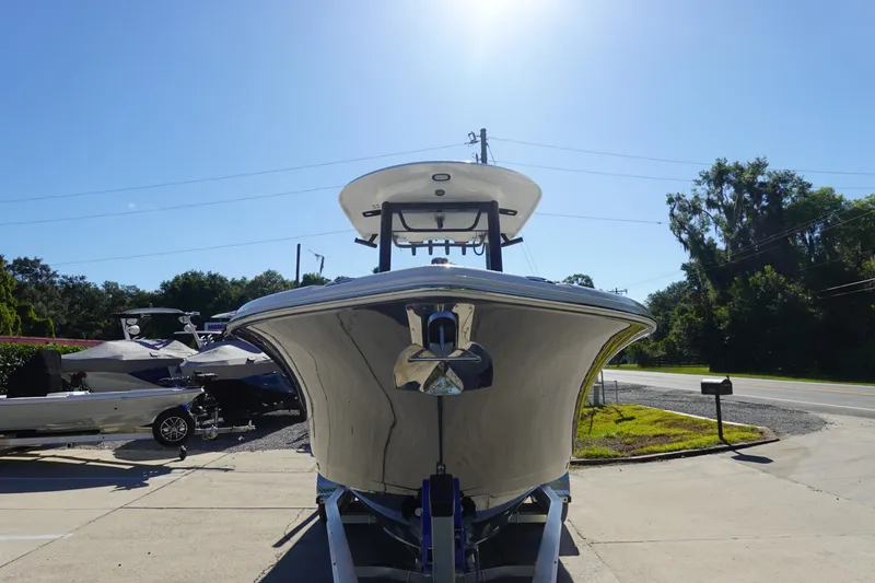 Slide: The Image of 2026 Sea Hunt Ultra 255 SE boat on trailer, sunny day, outdoor display. - 4