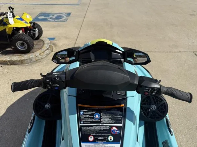 Slide: The Image of 2025 Yamaha Waverunner VX Limited HO dashboard and controls, parked on concrete surface. - 14