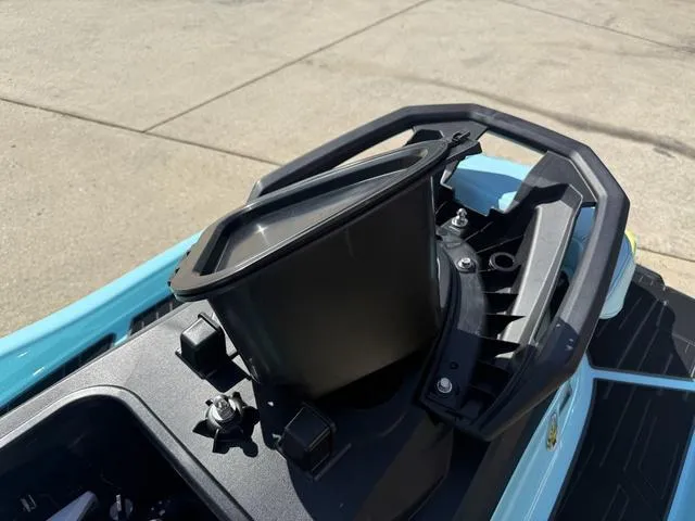 Slide: The Image of 2025 Yamaha Waverunner VX Limited HO dashboard with storage compartment, outdoor setting. - 22