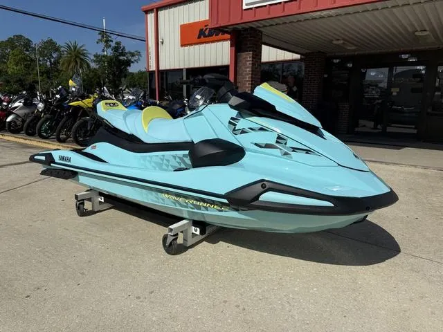 Slide: The Image of 2025 Yamaha Waverunner VX Limited HO in light blue, displayed outside a dealership. - 4